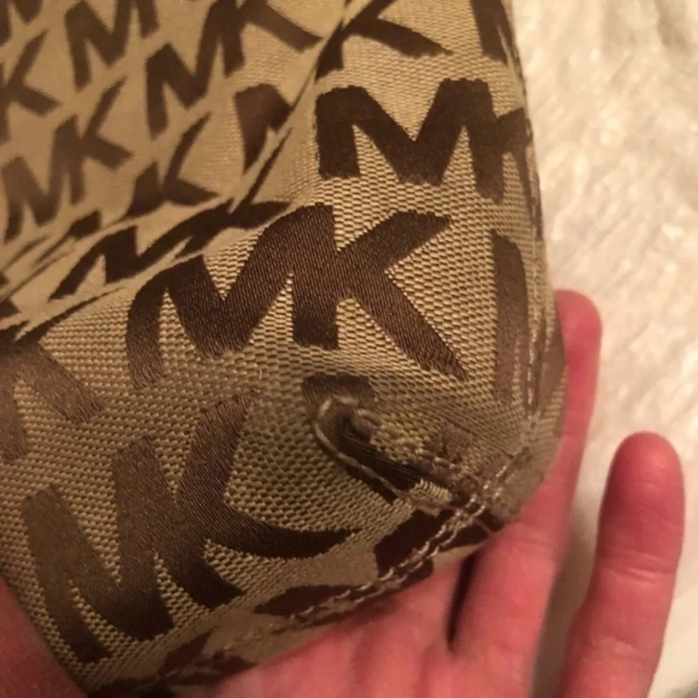 Michael kors brown monogram tote bag with blue leather trim